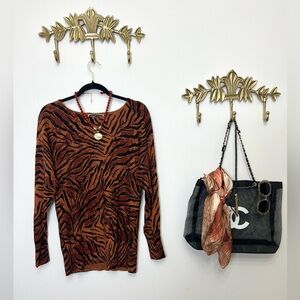 Melanie Lynn animal print with black rhinestones sweater S/M